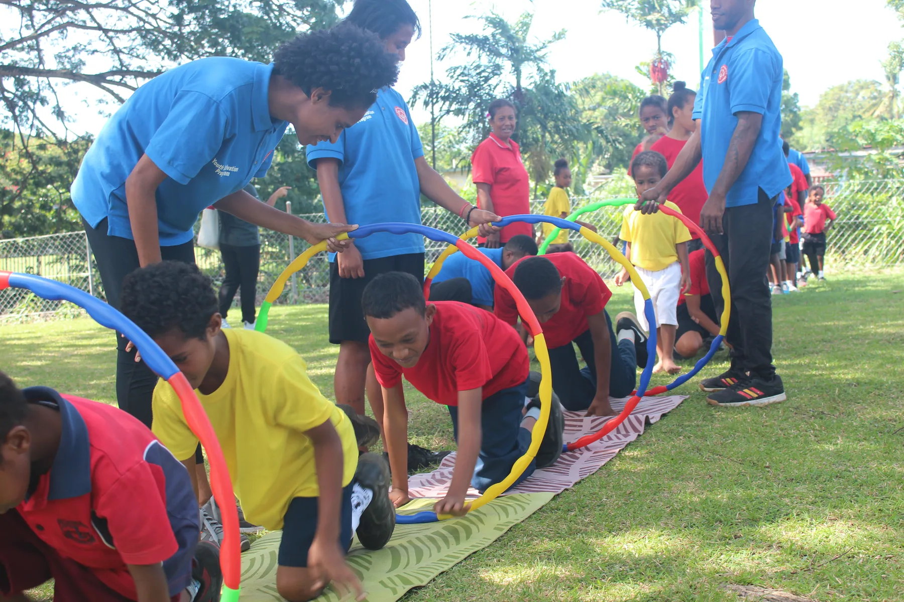 Athletes practice coordination using hoops