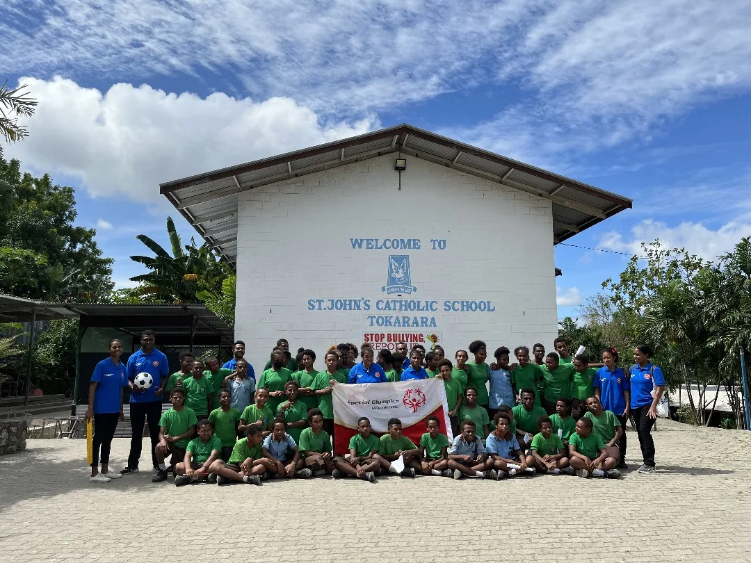 Students and community members gather at an inclusive school activity