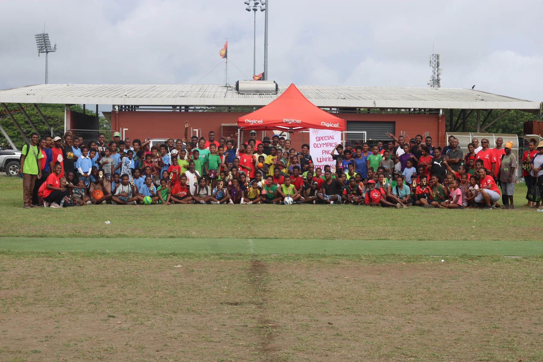 Athletes and supporters gather for a community event