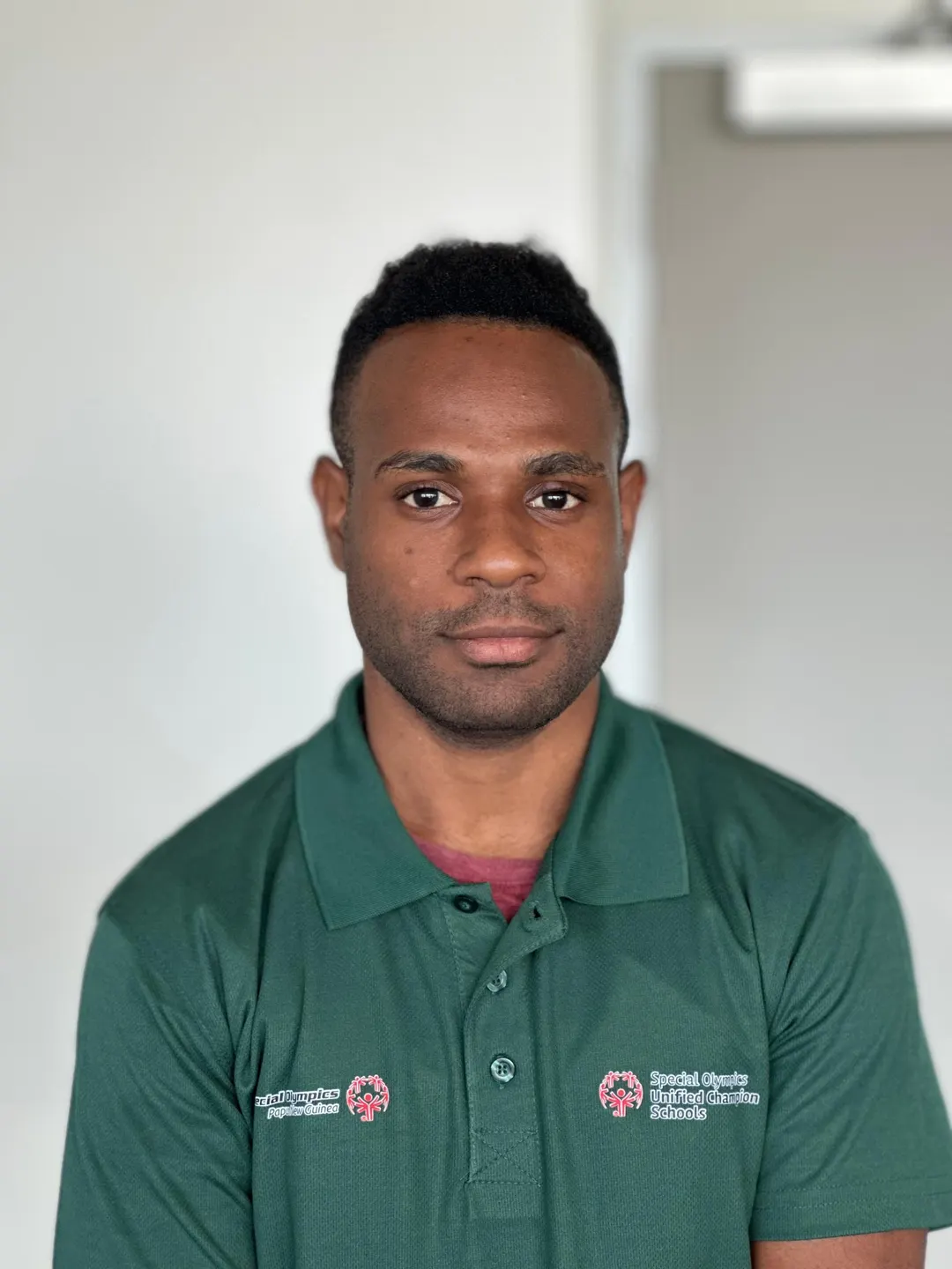 Volunteer portrait; name and position to be added.