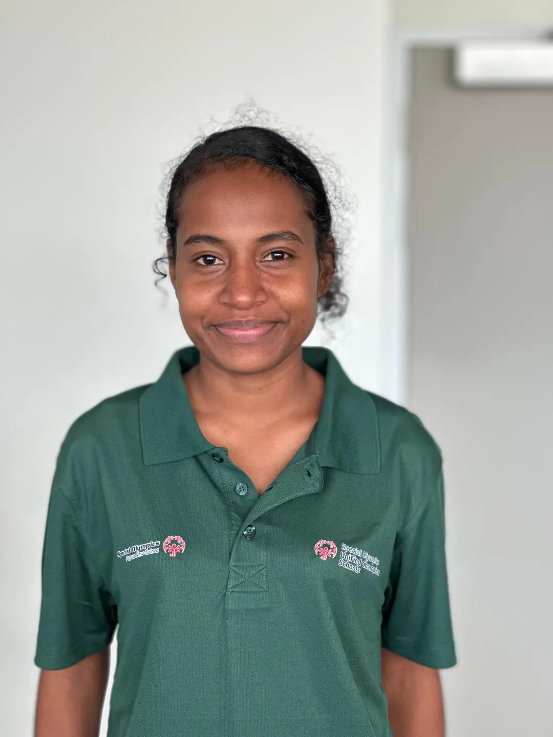 Volunteer portrait; name and position to be added.