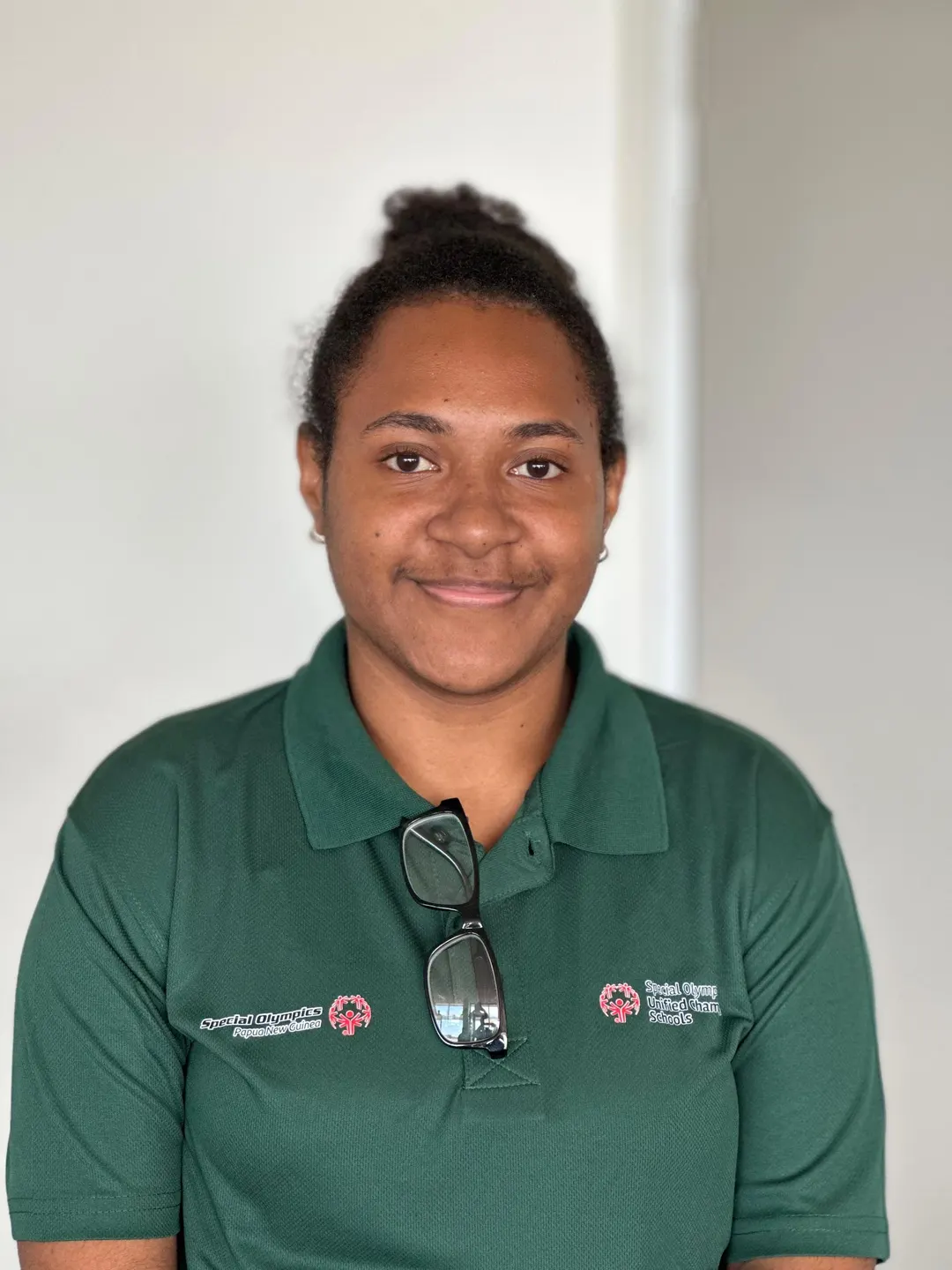 Volunteer portrait; name and position to be added.