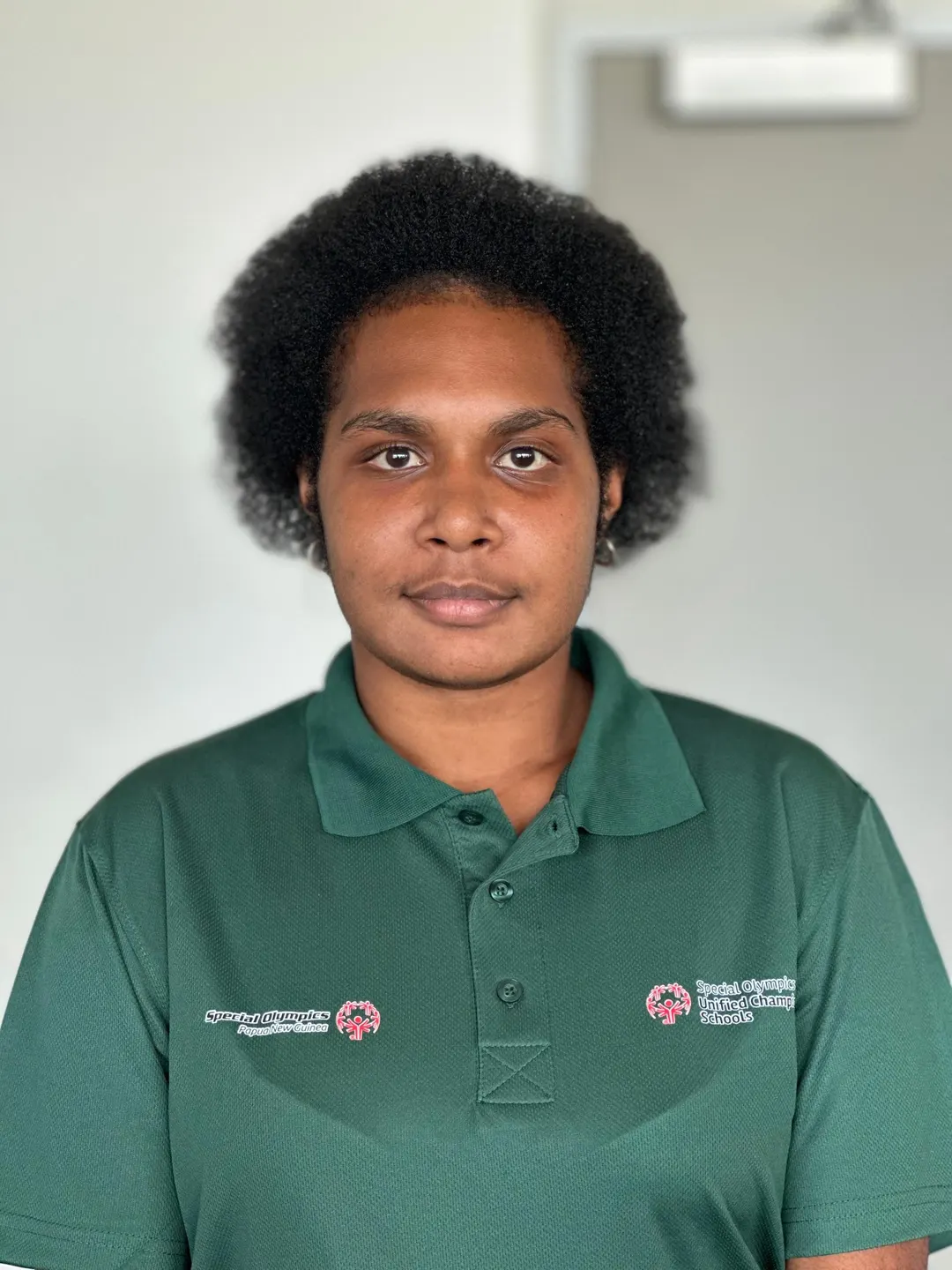 Volunteer portrait; name and position to be added.