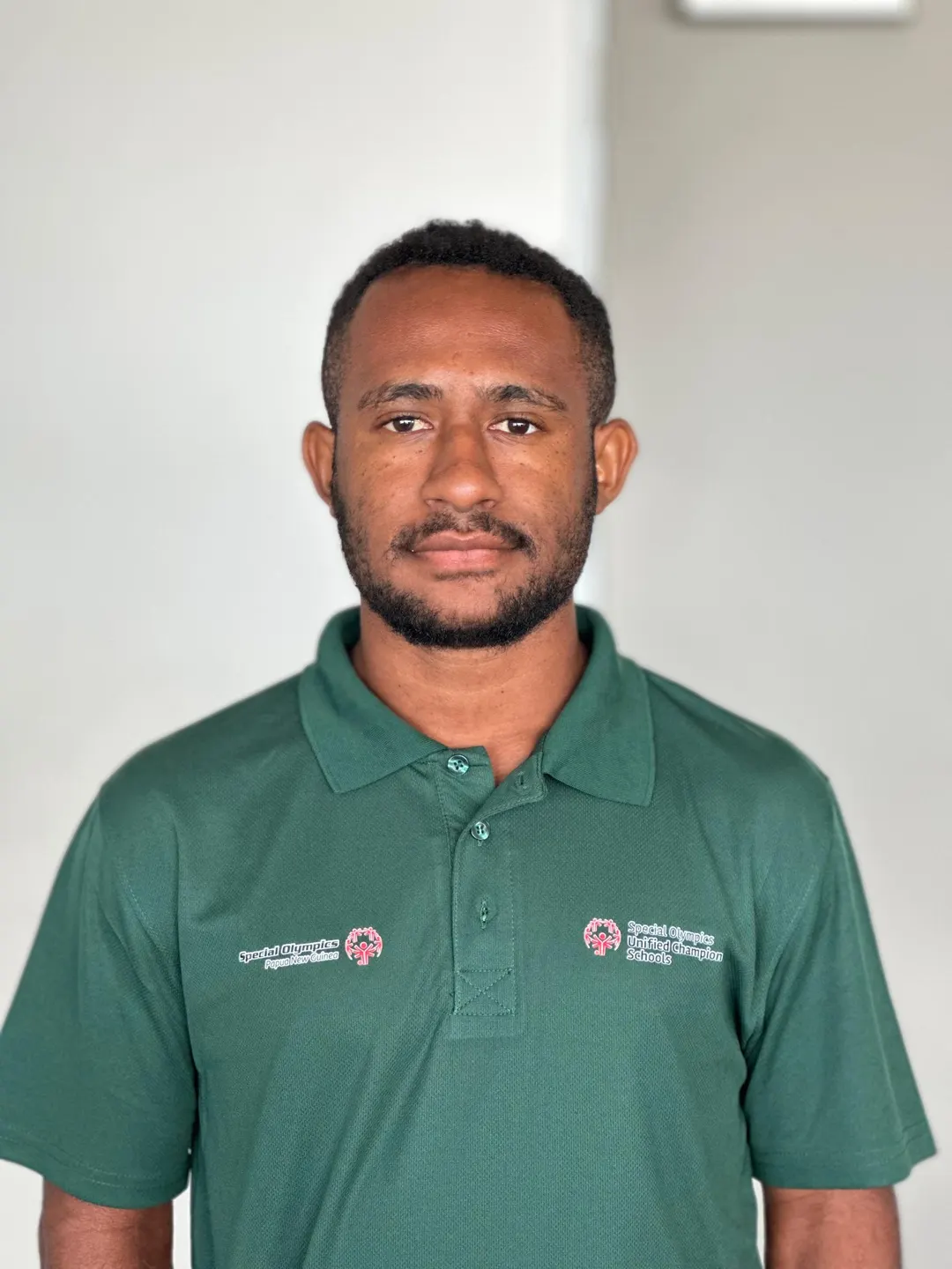 Volunteer portrait; name and position to be added.