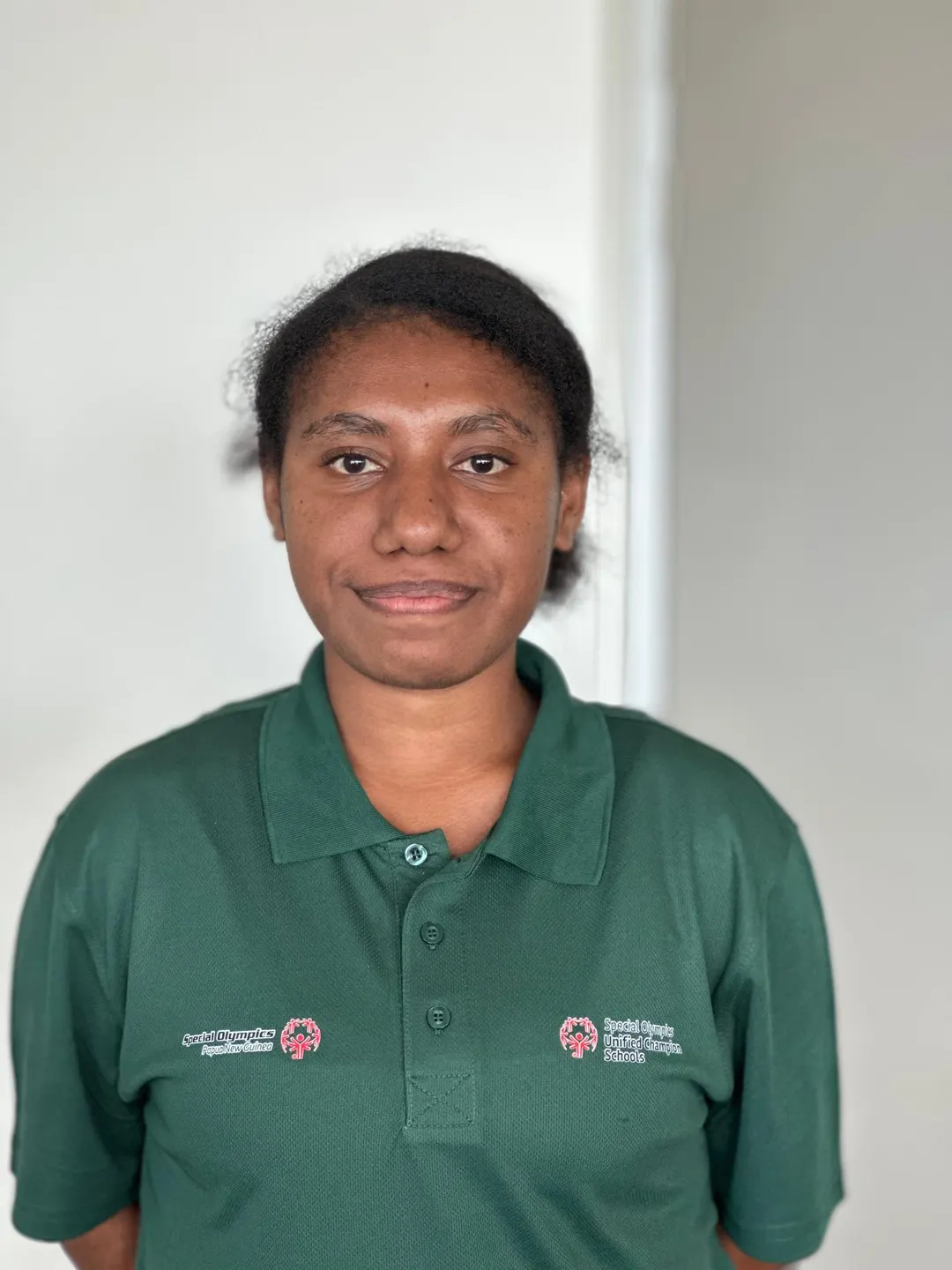 Volunteer portrait; name and position to be added.