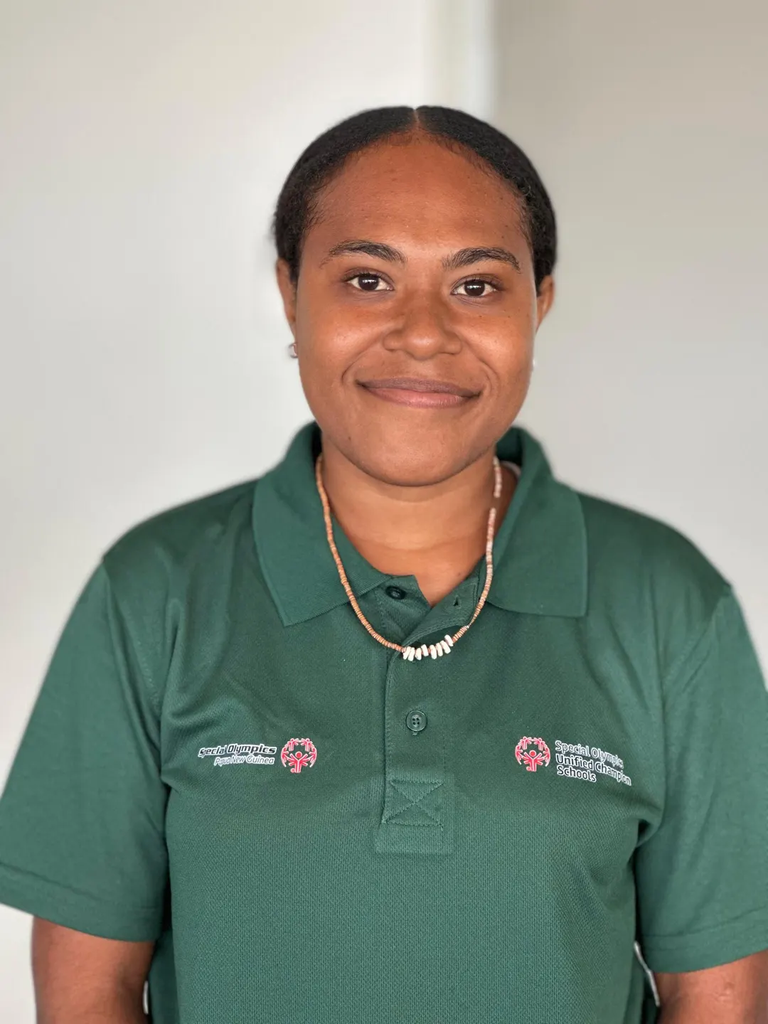 Volunteer portrait; name and position to be added.