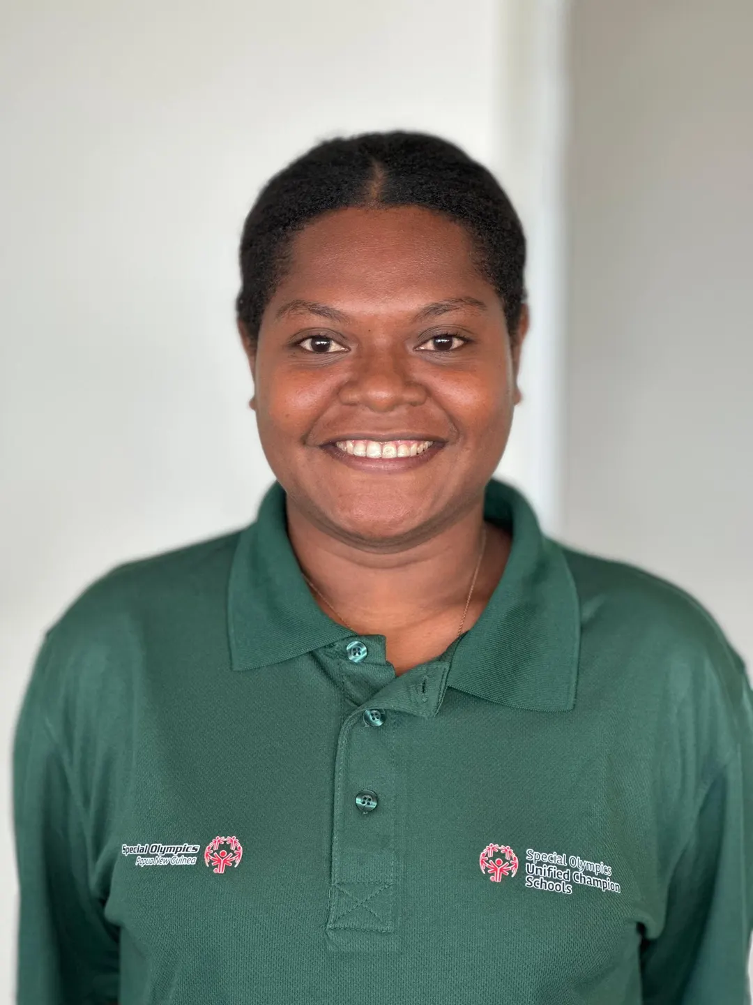 Volunteer portrait; name and position to be added.