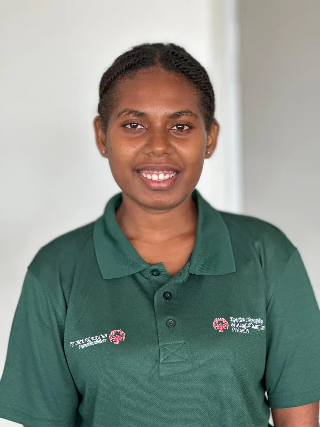 Volunteer portrait; name and position to be added.