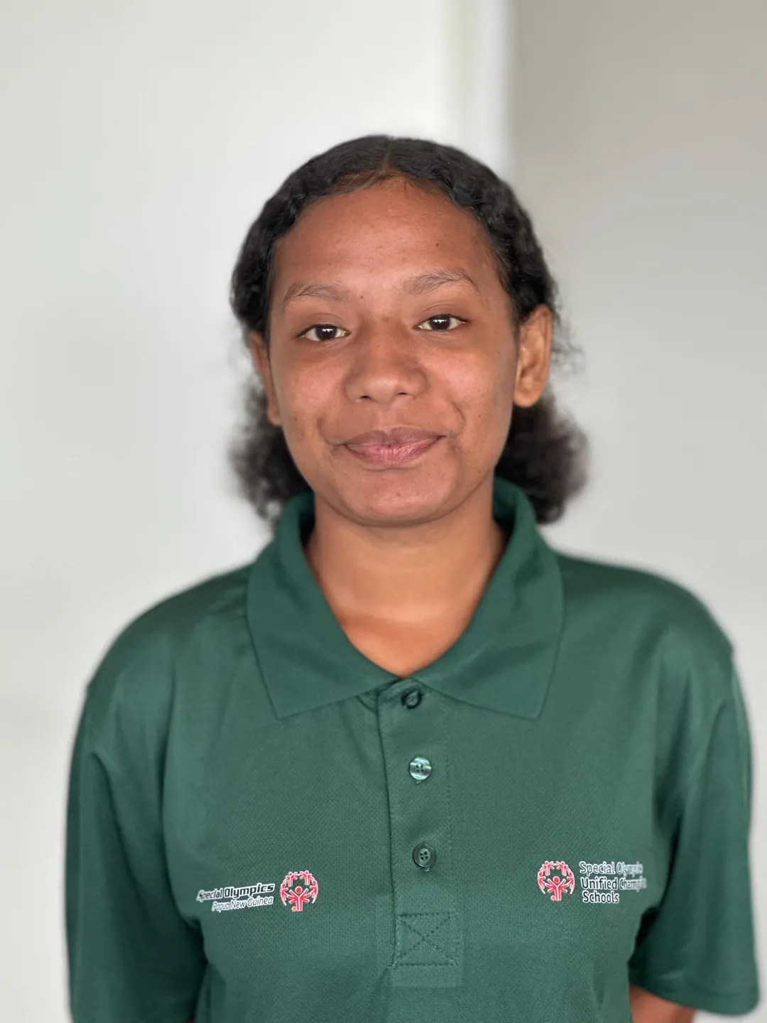 Volunteer portrait; name and position to be added.