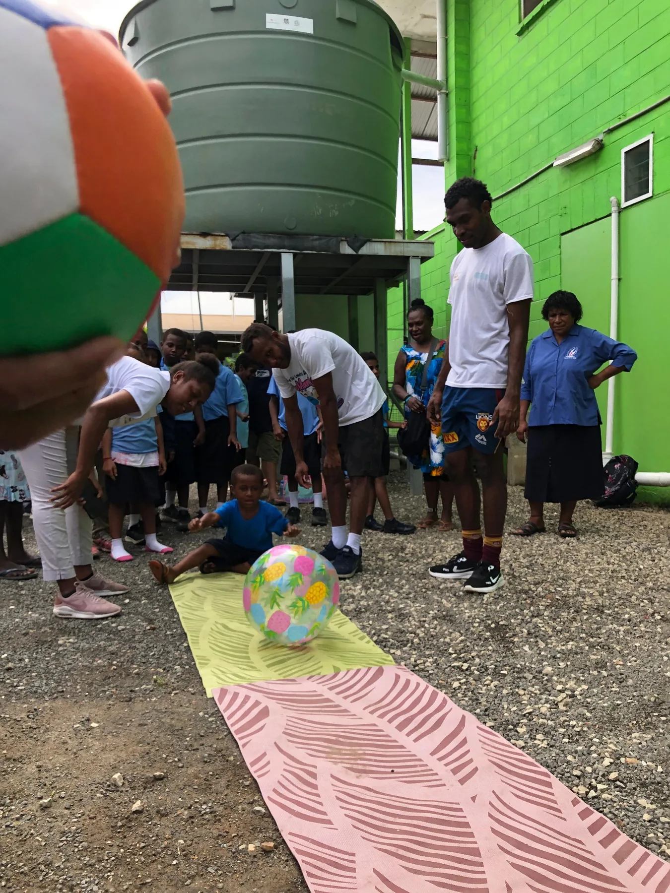 Young children take part in a movement game together